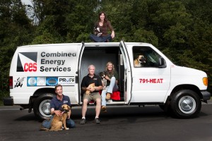 From L to R: CES Service Manager Paul Leyko, CES co-owner Mike Taylor, Sullivan SPCA Shelter Manager Debbie Dittert, and on top, Sullivan SPCA President Dana Heimbach, pose with some of the pooches and felines taking residence in the Rock Hill-based animal rescue home.