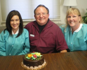 From L to R: Suzanne Fattorusso, Dr. David Ainbinder, DDS and Joyce Kane celebrate the dental assistants’ tenure for over 20 years at Gentle Dentistry.