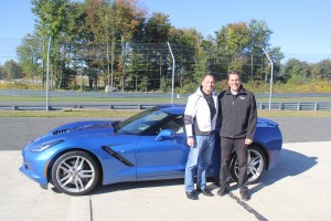 General Motors President Mark Reuss debuted the new 2014 Corvette Stingray at Monticello Motor Club during the IMPA Press Days, providing the international press their first opportunity to drive the car. Pictured with the 2014 Corvette Stingray are Monticello Motor Club President Ari Straus and General Motors President Mark Reuss.