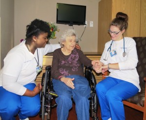 Mount St. Mary College nursing students, Saski Senorine and Amanda Fox, with Elant at Meadow Hill resident, Evelyn Anderson (middle).