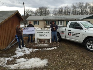 From L to R: Sullivan County SPCA manager, Debbie Dittert and CES’ John Illanovsky and Ira ‘Moose’ Liff, pose for a photo in front of the Rock Hill-based Sullivan County SPCA.