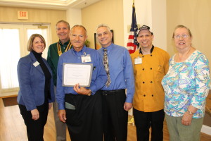 Maureen Torelli, left, vice president and executive director of Glen Arden; Doug Fazzino,  Goshen Rotary president ; Vincenzo Delle Donne;  Patrick Cucinelli, LeadingAge New York’s vice president for financial policy; Robert Barber, Glen Arden director of dining services; and Jody Tournoux, Chair Glen Arden Culinary Committee, celebrate Delle Donne’s recognition during a recent party to honor him. 