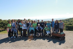 Elant at Fishkill residents and staff gather at one of the orchard’s scenic vistas.