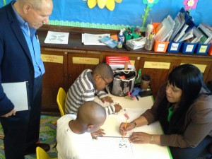 Dr. Vincent J. Carbone, Ed.D. (left), a board-certified behavior analyst and CEO of the internationally renowned Carbone Clinic, visits a classroom at Rebecca Turner Elementary School in Mount Vernon.