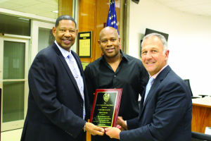 Mount Vernon City School District Superintendent Dr. Kenneth R. Hamilton and  Board of Education President Lesly Zamor presented Norm Savoie with the Knight Light Award.