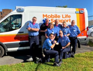 Mobile Life Support Employees Wear Pink